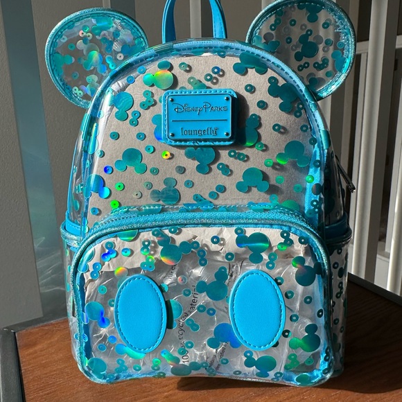best travel backpack with baby BabbleRoo Diaper Bag - Essentials Tote - Multi Function Water Resistant Diaper Bag, Travel Essentials Baby Bag Changing Pad, Stroller Straps & Pacifier Case MOLLE compatibility Makeup Bags & Toiletry Bags Color:METALLIC INDIGO Backpack Manufacturers Jansport Backpack